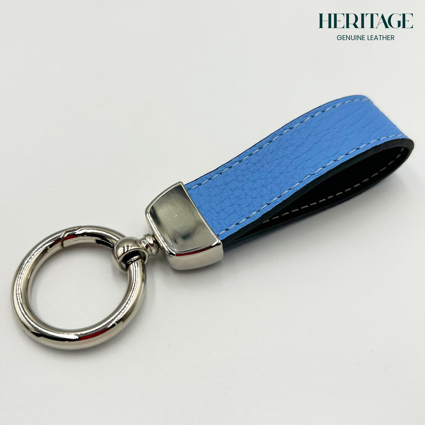 Llavero Metálico Plata con Correa en Cuero Granulado Celeste Heritage