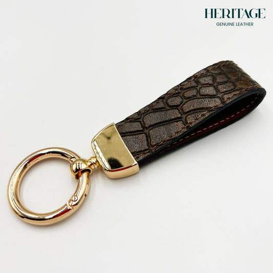 Llavero Metálico Dorado con Correa en Cuero Croco Café Heritage